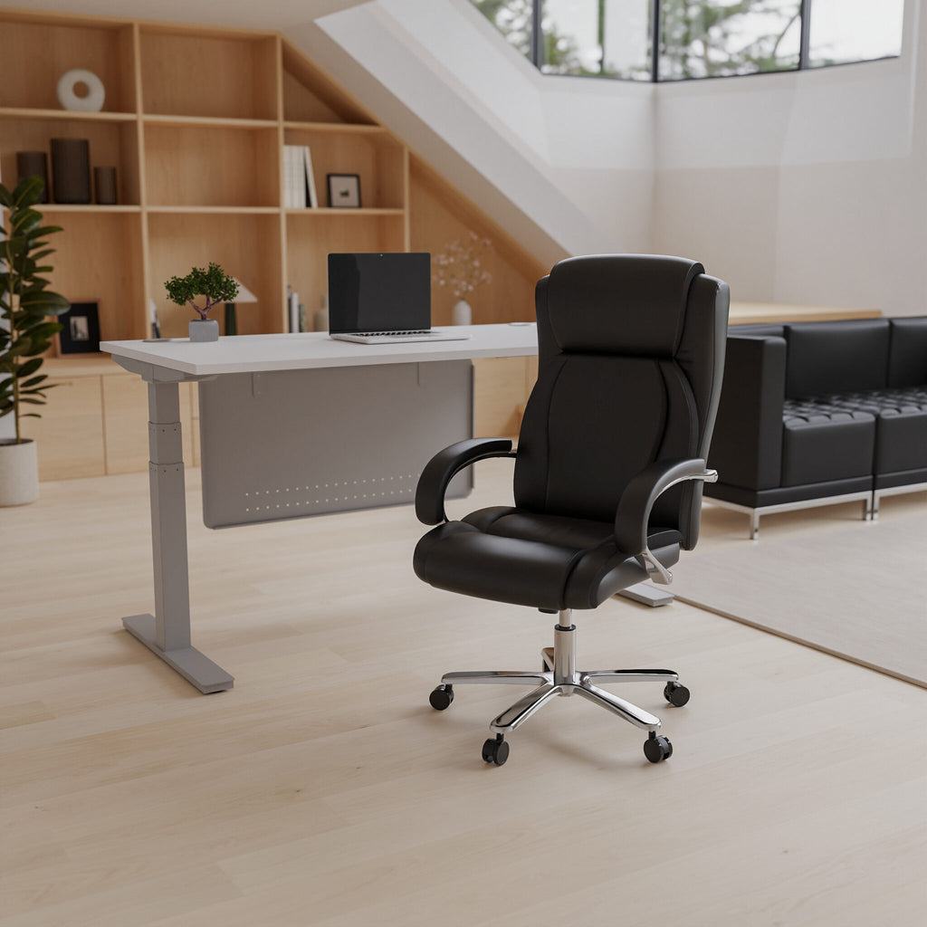 Black office chair in a modern office setting with a desk and bookshelf.