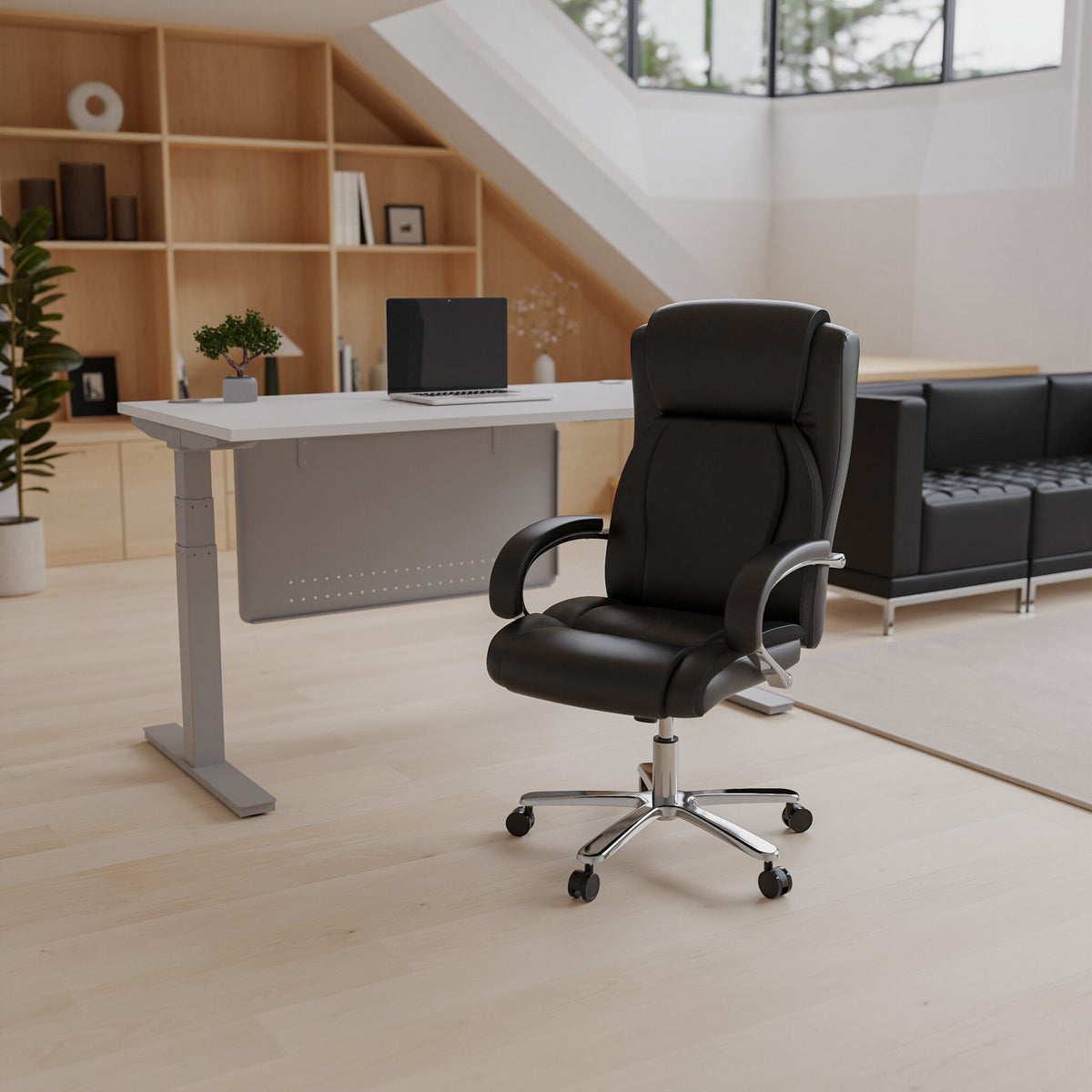 Black office chair in a modern office setting with a desk and bookshelf.