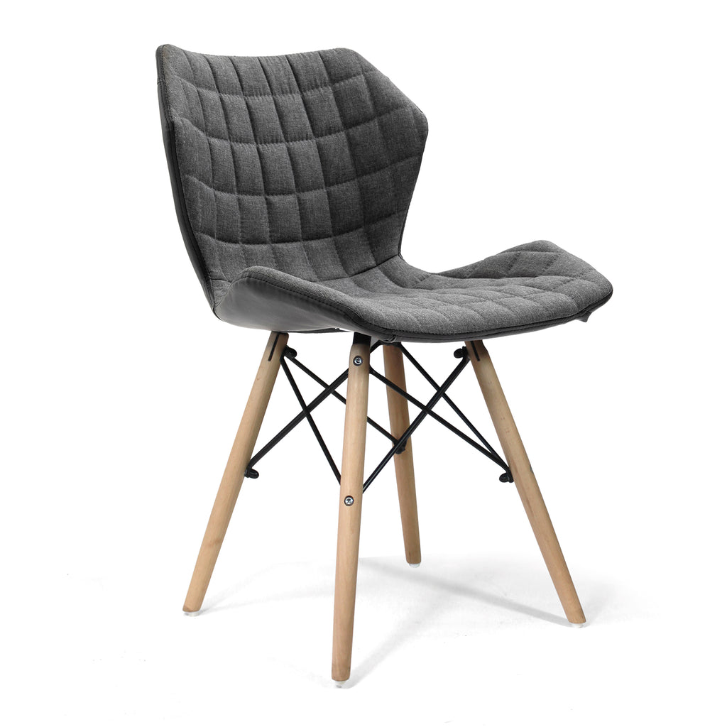 Grey quilted chair with wooden legs on a white background