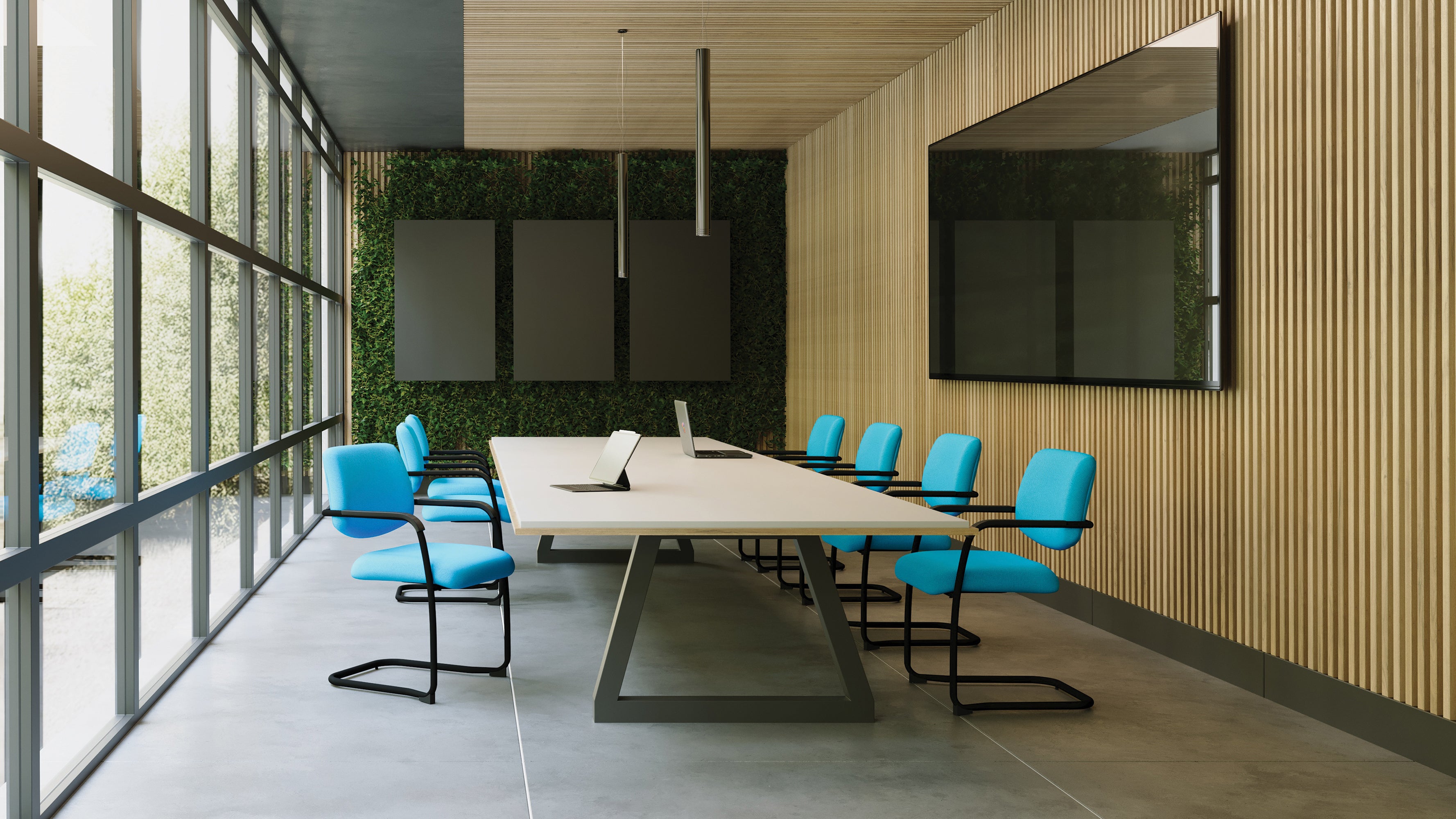 Modern conference room with a large table and blue chairs near large windows.