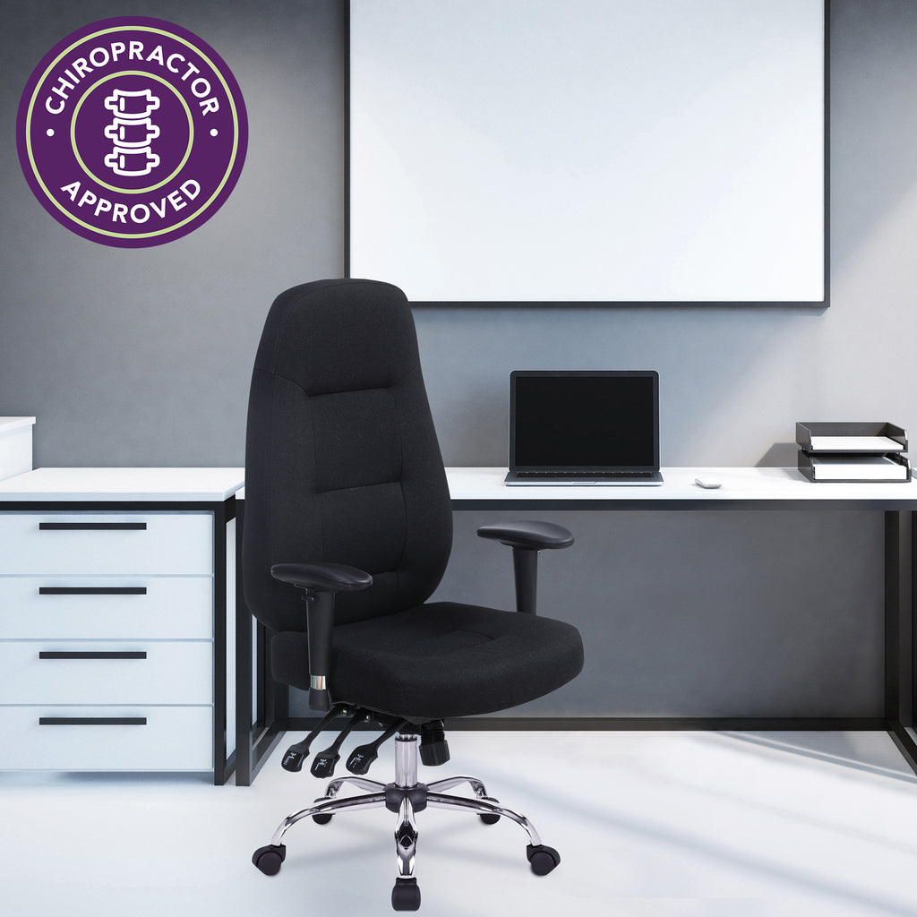 Black office chair in a modern office setting with a Chiropractor Approved badge.