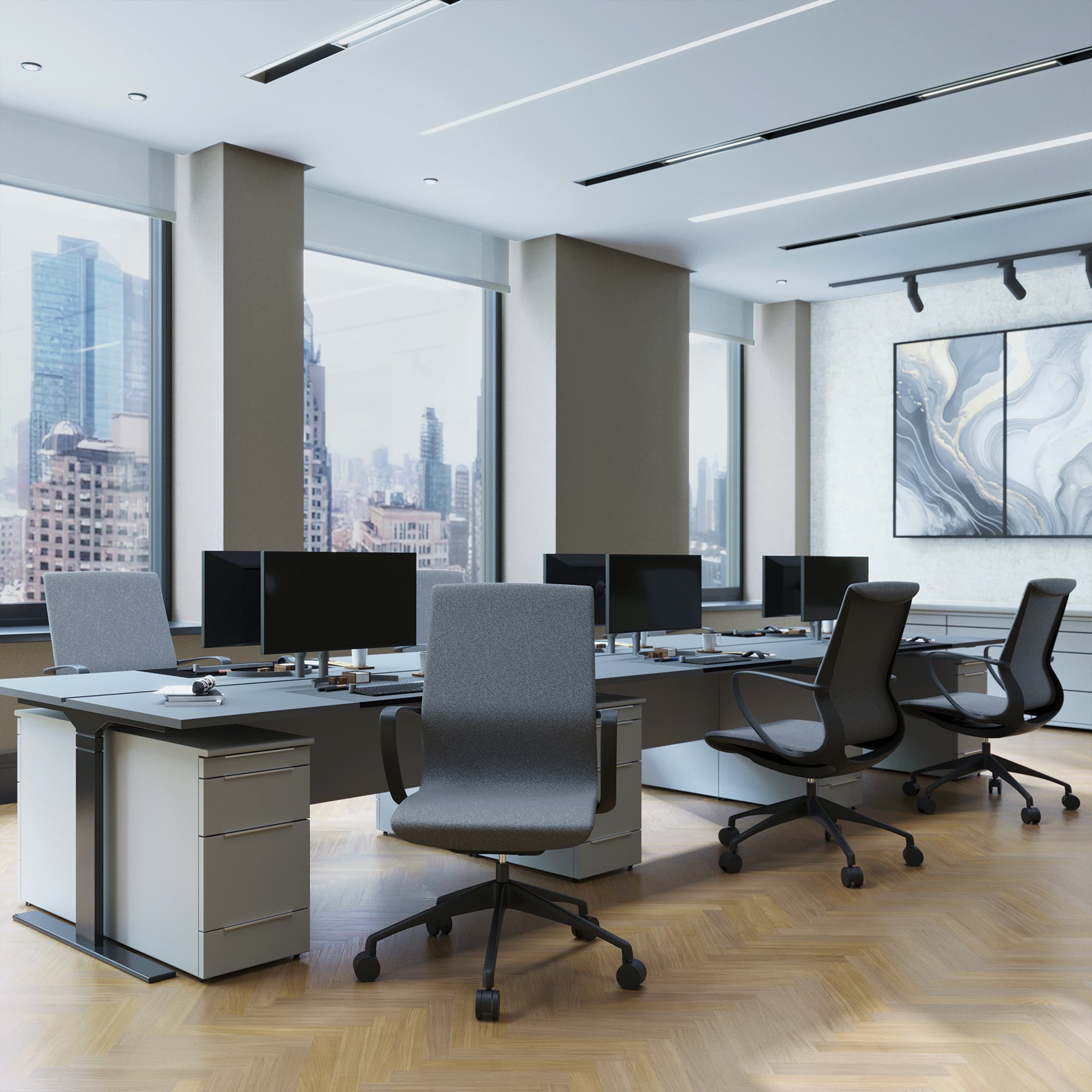 Modern office space with desks, chairs, and large windows overlooking a cityscape.