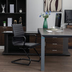 Modern office setup with a desk, chair, and computer equipment.