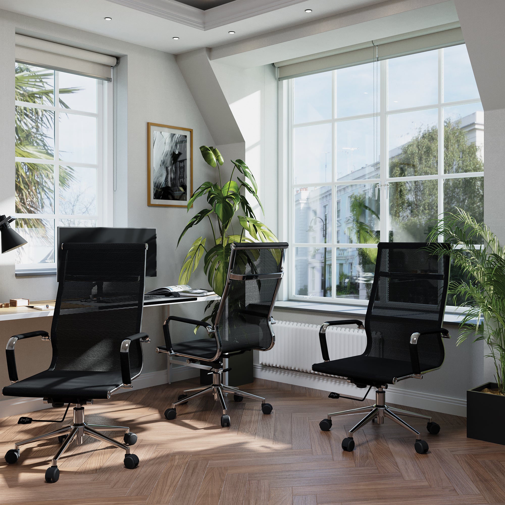 Modern office setup with black chairs and a large window.