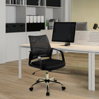 Black office chair in front of a white desk with a computer monitor in an office setting.