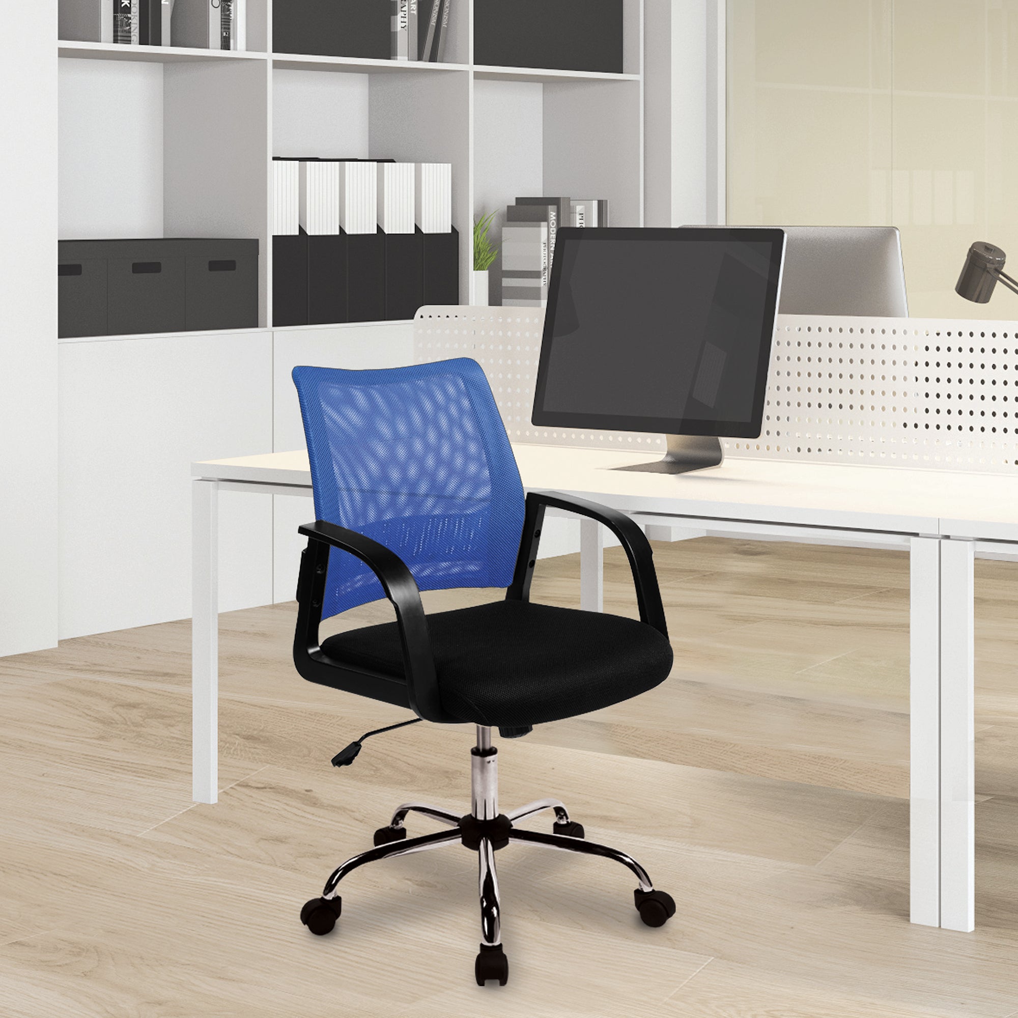Blue office chair in an office setting with desks and monitors.
