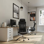 Modern office setup with a desk, chairs, and decor.