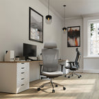 Modern office setup with a desk, chairs, and decor.