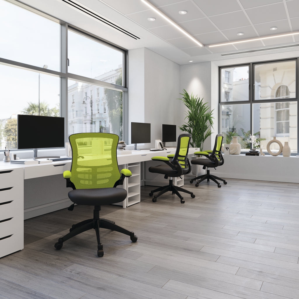 Modern office with green chairs and white desks