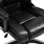 Close-up of a black office chair with leather seat and armrests on a white background