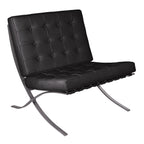 Black leather chair with metal frame on a white background