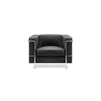 Black leather armchair with chrome frame on a white background