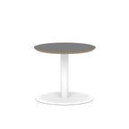 Round table with black top and white metal frame on a white background