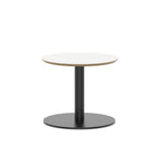 Round table with white top and black metal frame on a white background