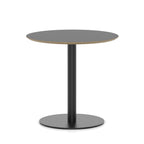 Round black table with metal frame on a white background