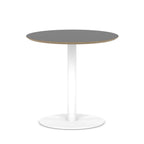 Round table with black top and white metal frame on a white background