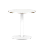 Small round white table with metal frame on a white background