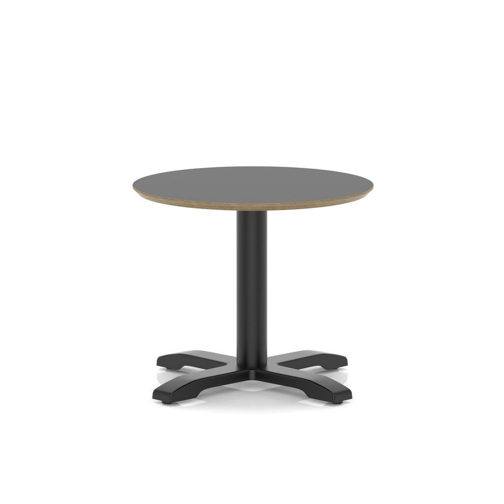 Small round black table with metal frame on a white background