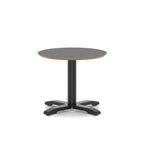 Small round black table with metal frame on a white background