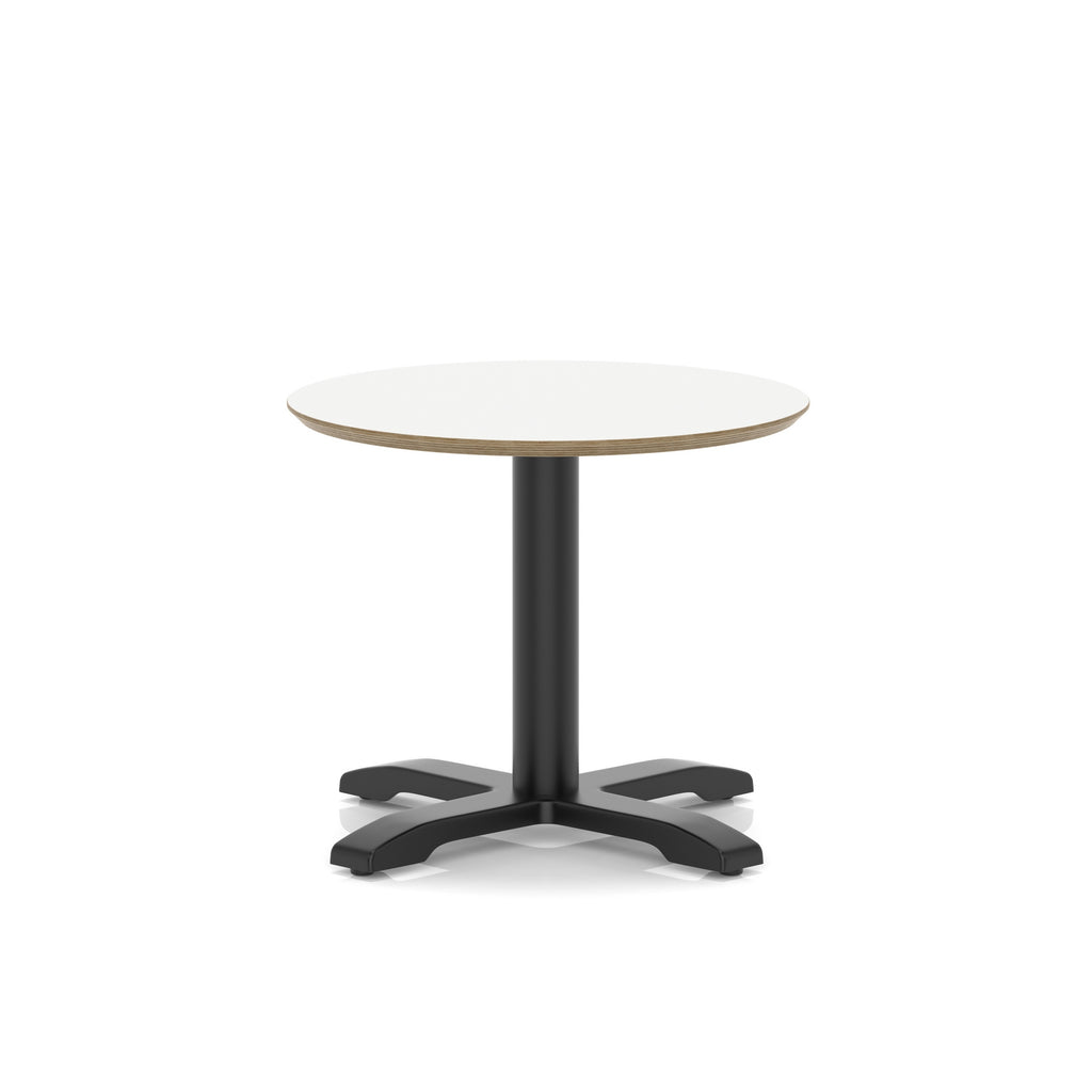 Small round table with white top and black metal frame on a white background