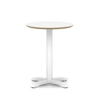 Round white table with metal frame on a white background