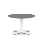 Round table with black top and white metal frame on a white background
