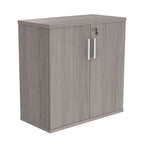 Cupboard with a silver handle on a white background