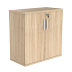 Cupboard with a silver handle on a white background