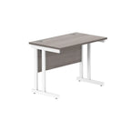 Office desk with grey wood-effect top and white legs on a white background