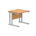 Office desk with wood-effect top and silver legs on a white background