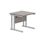 Office desk with grey wood-effect top and silver legs on a white background
