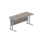 Office desk with grey wood-effect top and silver legs on a white background