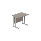 Office desk with grey wood-effect top and silver legs on a white background