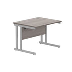 Office desk with grey wood-effect top and silver legs on a white background
