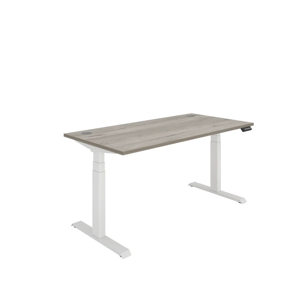 Height adjustable desk with grey wood-effect top and white frame on a white background