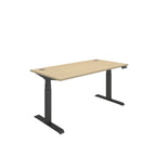 Height adjustable desk with wood-effect top and black frame on a white background