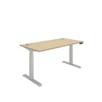 Height adjustable desk with wood-effect top and silver frame on a white background