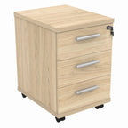 Wooden file cabinet with three drawers on wheels against a white background