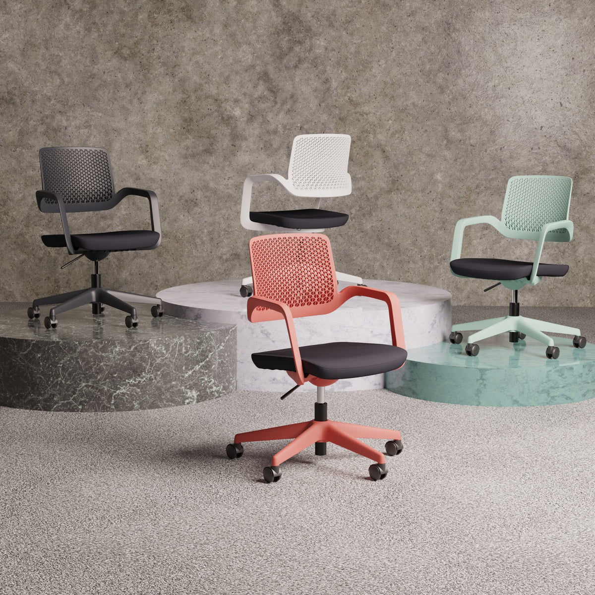 Four office chairs in different colours shown on a round pedestals with a grey wall in the background