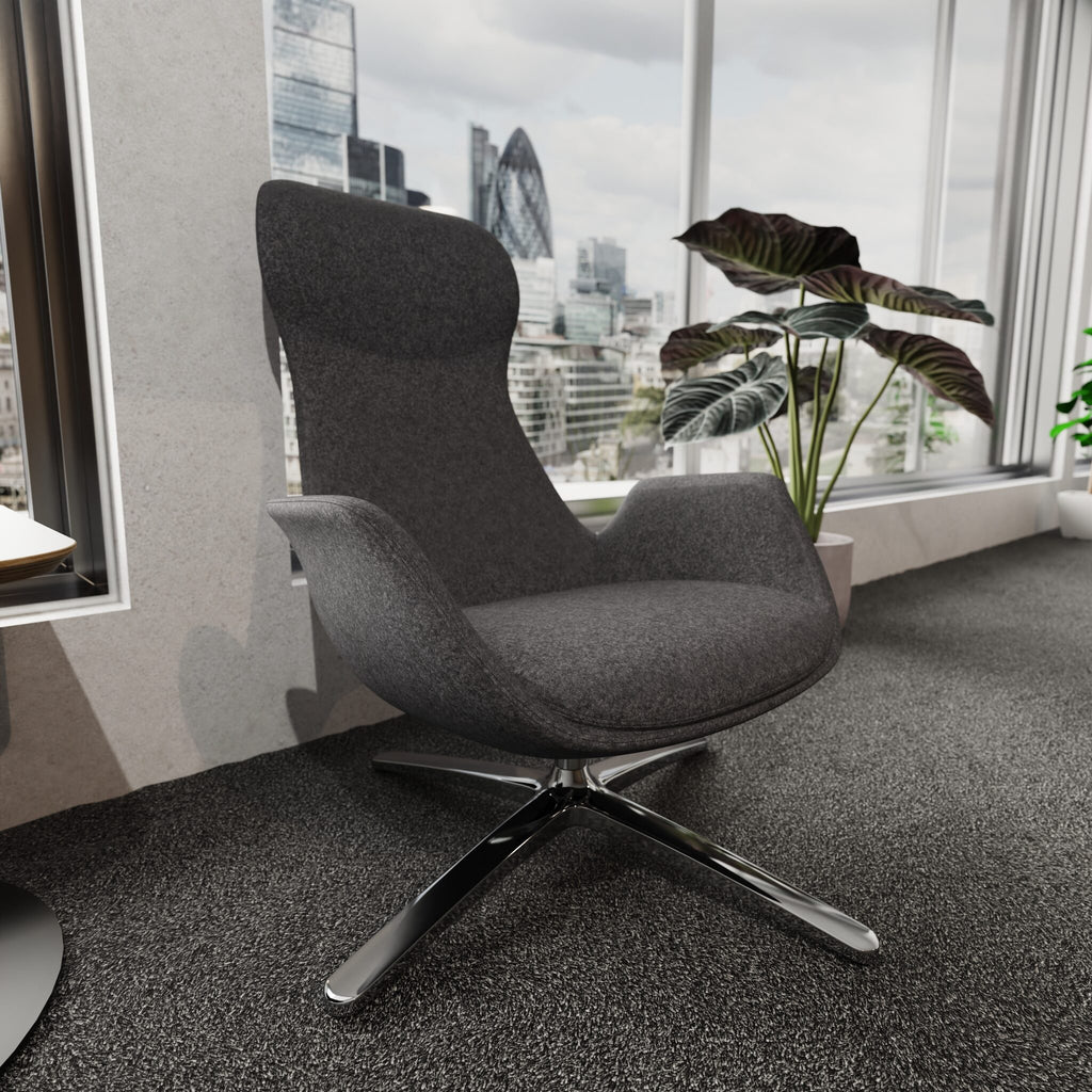 Modern high-back grey chair with metal frame shown in a office setting with windows and plants in the background
