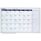 Calendar with handwritten notes and events on a whiteboard