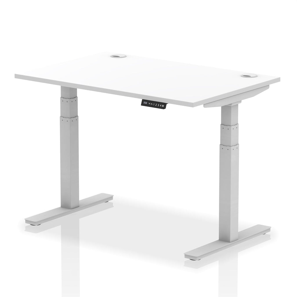 Adjustable height desk with white top and metal legs on a white background