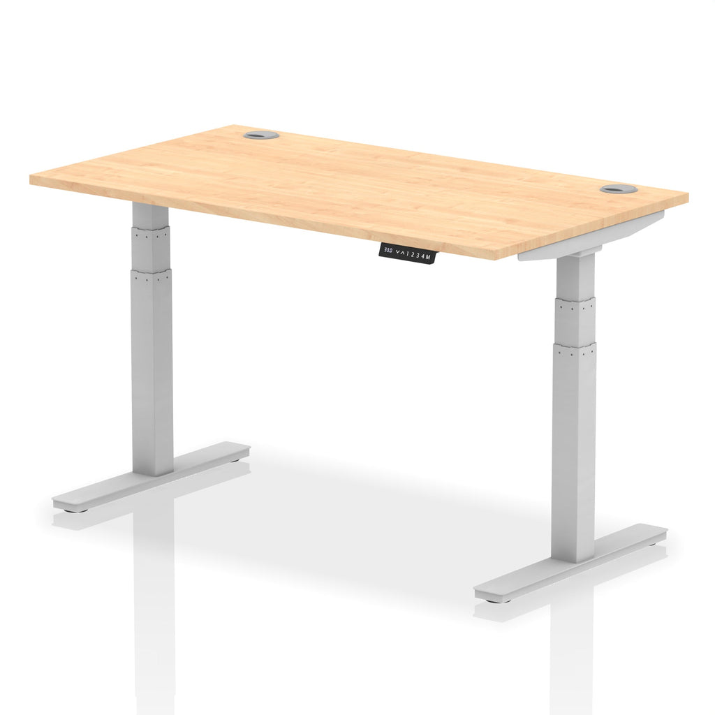 Adjustable height desk with wood-effect top and metal legs on a white background