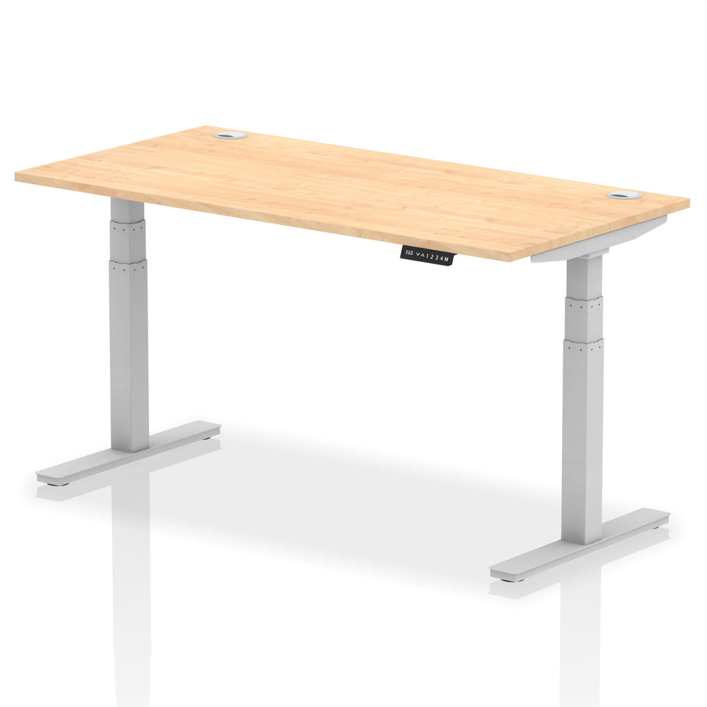 Adjustable height desk with wood-effect top and metal legs on a white background