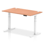 Adjustable height desk with wood-effect top and metal legs on a white background