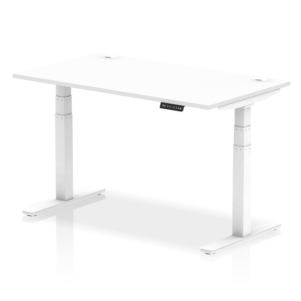 Adjustable height desk with white top and metal legs on a white background