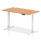 Adjustable height desk with wood-effect top and metal legs on a white background