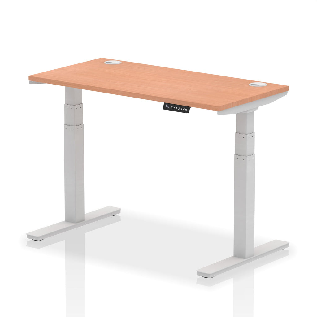 Adjustable height desk with wood-effect top and metal legs on a white background