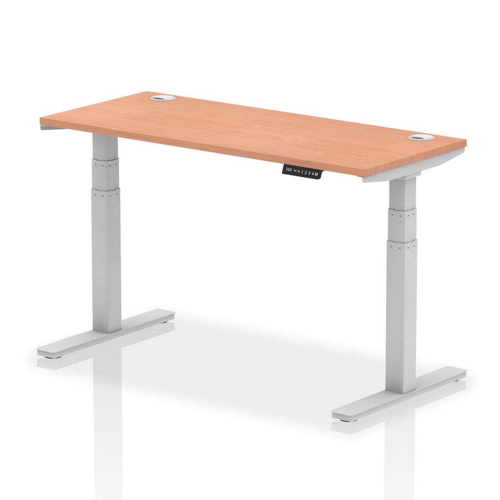 Adjustable height desk with wood-effect top and metal legs on a white background