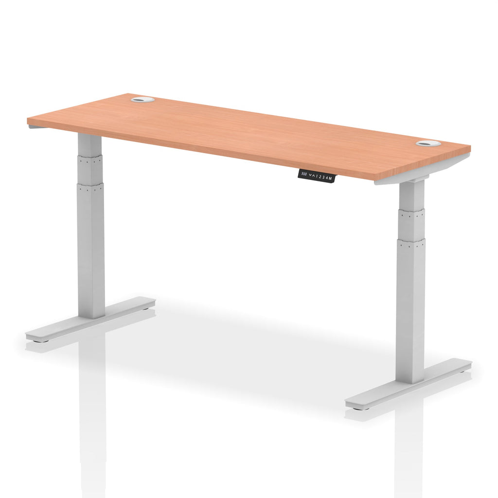 Adjustable height desk with wood-effect top and metal legs on a white background